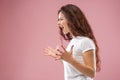 The young emotional angry woman screaming on pink studio background Royalty Free Stock Photo