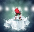 Screaming hockey player on abstract ice cubes background Royalty Free Stock Photo