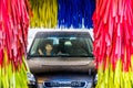 Screaming kid in car at carwash Royalty Free Stock Photo