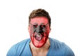 Screaming man with Albania flag on face. Royalty Free Stock Photo