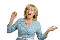 Screaming mature woman on white background. Royalty Free Stock Photo