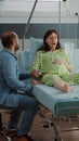 Screaming pregnant woman going into labor in hospital ward Royalty Free Stock Photo