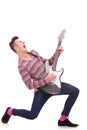 Screaming young guitarist playing his guitar