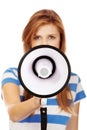 Screaming young teenage woman with megaphone Royalty Free Stock Photo