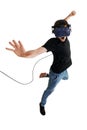 Screeming young man isolated on white background playing game in virtual reality glasses
