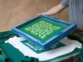 Screen printing in progress with eco friendly inks Royalty Free Stock Photo