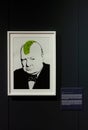 Screen prints titled Winston Churchill May Day and Monkey Queen, by Banksy