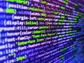 Screen of web developing code on dark background. Abstract source code background. Digital technology on display. Programming code Royalty Free Stock Photo