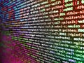 Screen of web developing code on dark background. Creative Js HTML5 closeup set on background. HTML5 in editor for website Royalty Free Stock Photo