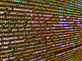 Screen of web developing code on dark background. Internet app development and design. Computer language script code screen. Royalty Free Stock Photo