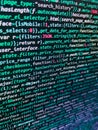 Screen of web developing code on dark background. Modern tech. IT coding on monitor screen. Developer working on program codes in