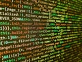 Screen of web developing php code on dark background. Programmer working in a software develop company office. Web programming and Royalty Free Stock Photo