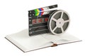 Screenplay Film concept. Book with film trips and clapperboard, Royalty Free Stock Photo