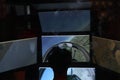 Screens of a flight simulator for pilot training