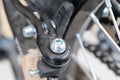 Screw on brakes of rear bicycle wheel