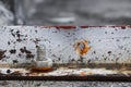 nut rusted sticking iron plate on concrete floor Royalty Free Stock Photo