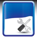 Screwdrive and wrench on blue halftone banner Royalty Free Stock Photo