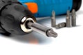 Screwdriver bit fixed in drilling machine chuck Royalty Free Stock Photo