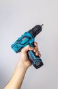 Screwdriver in the hands of a man isolate. Selective focus. Royalty Free Stock Photo