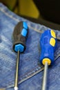 Screwdriver pair rubber grip fixing closeup vertical photo