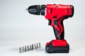 Screwdriver with rechargeable batteries, red, modern and reliable