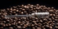 A screwdriver rests on a stack of singleorigin coffee beans Royalty Free Stock Photo