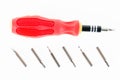 A screwdriver with a set of changable nozzels isolate on white b Royalty Free Stock Photo