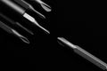 Screwdriver tips different shapes and sizes close up. Manual metal mini screwdriver and set of the interchangeable bits Royalty Free Stock Photo