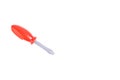 Screwdriver, toy plastic screwdriver with red handle, children\'s tool. Isolated white background Royalty Free Stock Photo