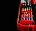 Screwdriver various replaceable tips in red plastic box Royalty Free Stock Photo