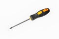 A screwdriver. A working tool. A cruciform screwdriver on a white background Royalty Free Stock Photo