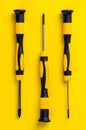 These screwdrivers are arranged in a row, showcasing their design and functionality against a bright backdrop Royalty Free Stock Photo