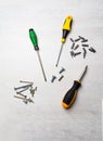 Screwdrivers and bits on desk background Royalty Free Stock Photo
