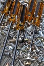 Screwdrivers and components bolts, nuts, washers, screws Royalty Free Stock Photo