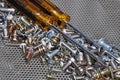 Screwdrivers and components bolts, nuts, washers, screws Royalty Free Stock Photo