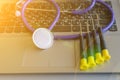 Screwdrivers on a laptop. Stethoscope on laptop keyboard. Health care or IT security concept. Laptop repair concept. Computer Royalty Free Stock Photo