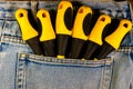 Screwdrivers in pocket of blue jeans Royalty Free Stock Photo