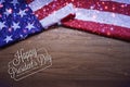 Screwed Up USA Flag on Brown Wooden Board Background Royalty Free Stock Photo