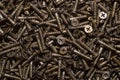 Screws background. heap of tapping screws. pile of fasteners Royalty Free Stock Photo