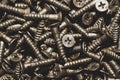 Screws background. heap of tapping screws. pile of fasteners Royalty Free Stock Photo
