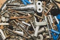 Screws background. heap of tapping screws. work tool. pile of fasteners. bolts and nuts. metal scrape Royalty Free Stock Photo