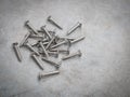 Screws on a cement background Royalty Free Stock Photo