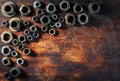 Screws on dirty wooden table Royalty Free Stock Photo