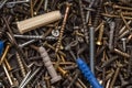 Screws, nuts, bolts, washers  lying on a wooden table Royalty Free Stock Photo