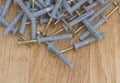 Screws on wooden background close up, Useful in construction Royalty Free Stock Photo