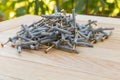 Screws on wooden background close up, Useful in construction Royalty Free Stock Photo