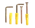 Screws and yellow plastic dowels Royalty Free Stock Photo