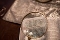 Scripture Reading with magnify glass Royalty Free Stock Photo