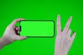 Scroll on Smartphone with Green Mock-up Screen Chroma Key. Phone green screen for product placement. Gestures on touch