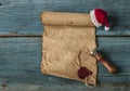 scrolls of old paper on a wooden table. Antique background Royalty Free Stock Photo